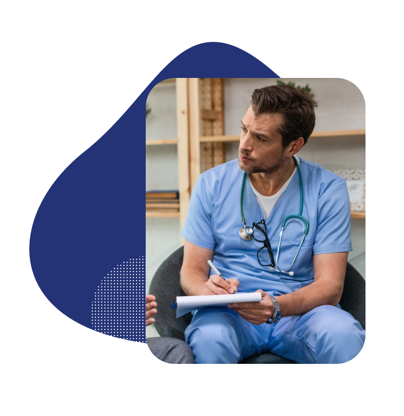 A male nurse taking a patient's vitals.
