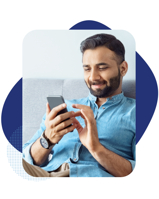 Patient in hotel room using phone to access AI-powered medical triage tool.