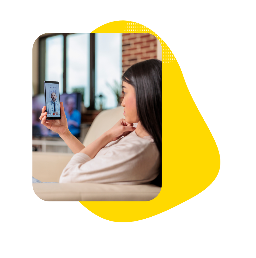 Young patient using phone to talk to a doctor about telemedicine services.